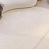 七棉圓形地毯：臥室床邊的溫馨畫卷