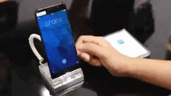 小米激光投影电视9999元开售 手机隐藏式指纹识别技术来了！