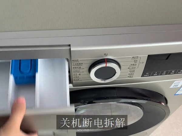 洗衣机里真有水泥块！拆解博世滚筒洗衣机