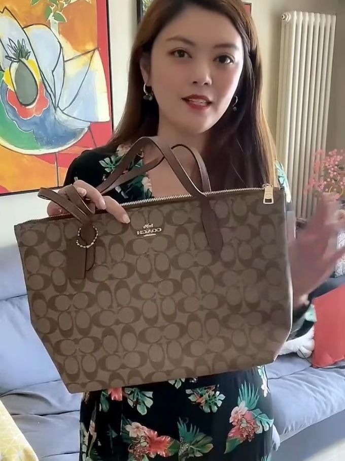 蔻驰女士单肩包