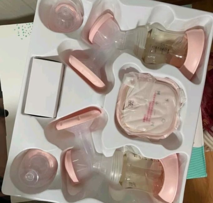 新贝电动吸奶器