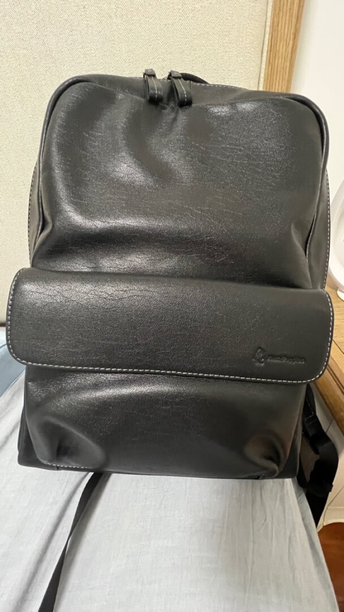 暇步士男士双肩包