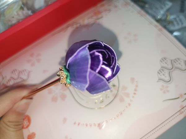 紫色的花花簪子配上紫色的汉服