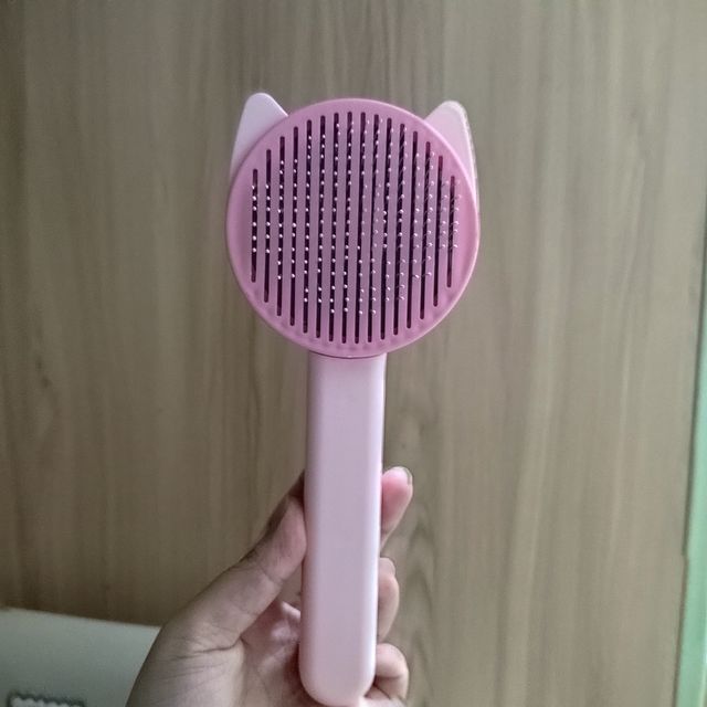可爱的猫饼梳毛器