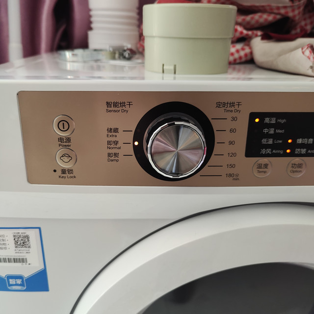 声音大小:本身声音不大,但是放了件带纽扣