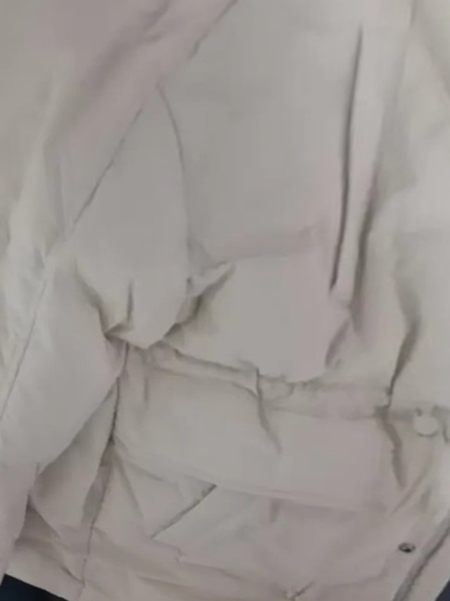 认证挑战赛。雪中飞冬季羽绒服女连帽中长款