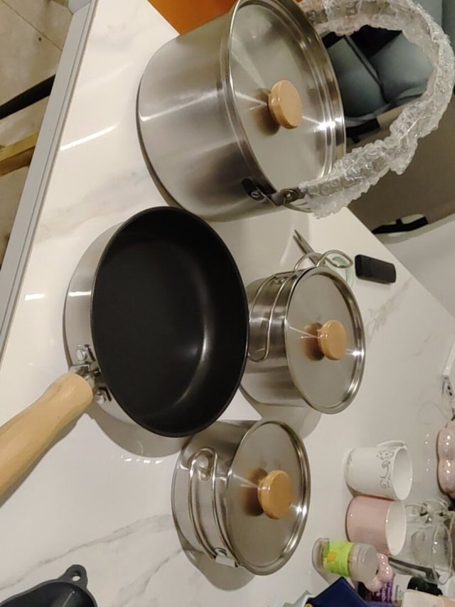 
这一套确实不错，做工精细，木制把手隔热