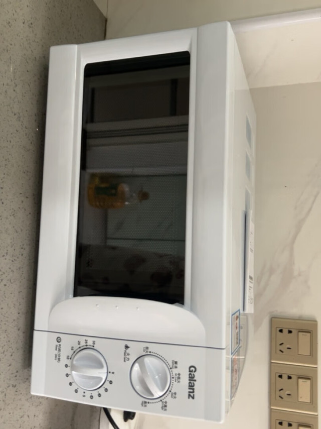 买了微波炉外观看起来很不错微波炉比想象