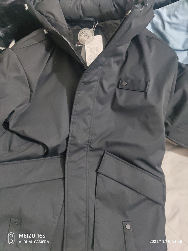 衣服质量不错，做工和保暖效果都很好，是羽