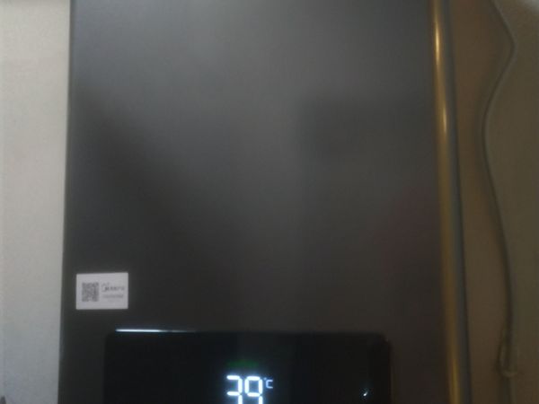 购入美的TC5热水器，淘汰用了十四年的林内
