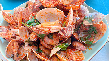 快来青岛，品味炒蛤蜊的独特魅力，让你流连忘返！