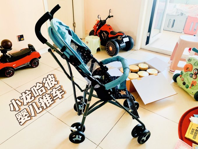 小龙哈彼婴儿推车怎么样 买2k奶粉的赠品还可以吧?