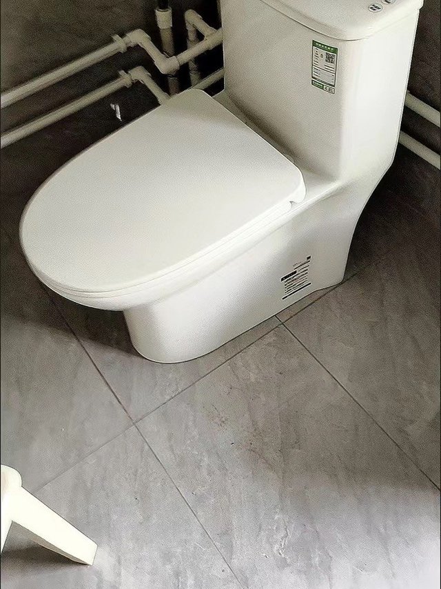 九牧虹吸式马桶