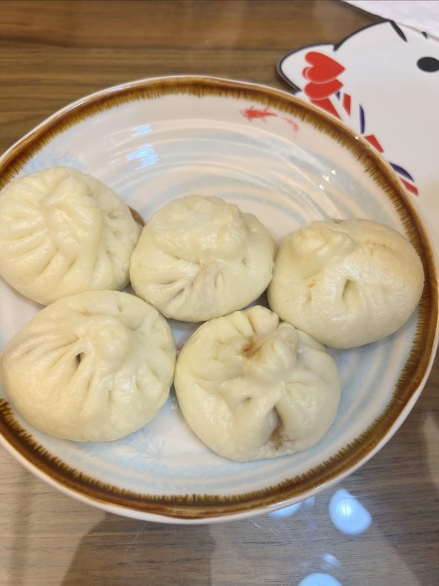 桃花点点的包子，还真的挺好吃