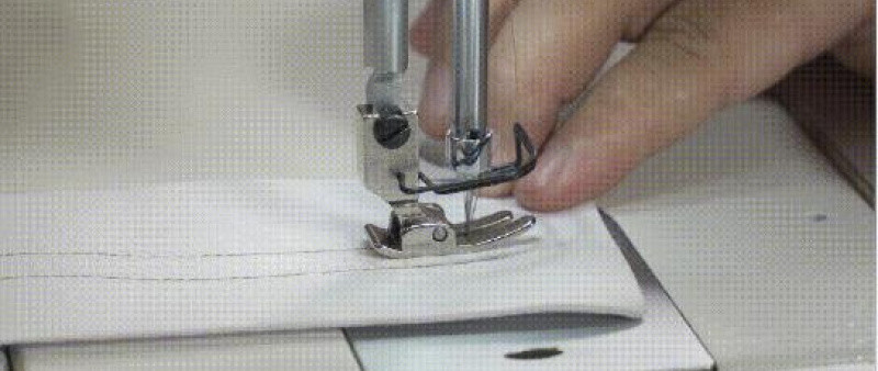 缝纫机送布动作的协调