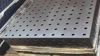 产生磨床铸铁平板工作台运动不均匀的原因