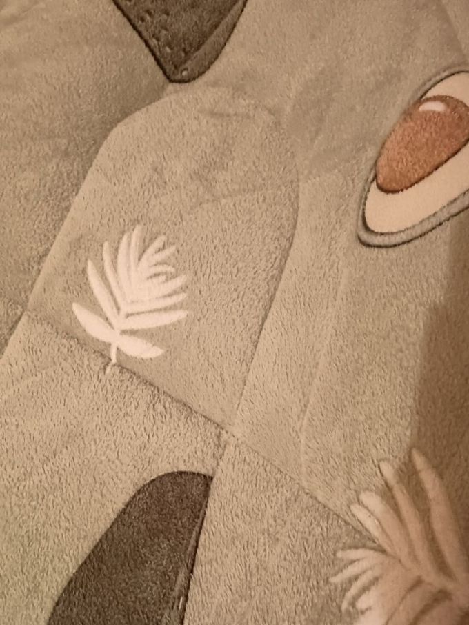 名创优品毯子