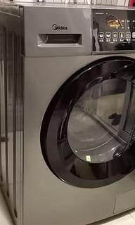 美的滚筒洗衣机全自动 V33 洗烘一体机 除菌净螨 羽绒云朵烘  简尚系列 超薄款 10公斤 MD100V33WY
