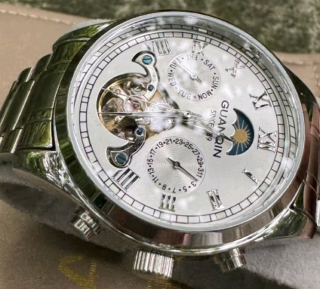 冠琴(guanqin)手表男机械表全自动镂空飞轮瑞士品质防水夜光皮带男士