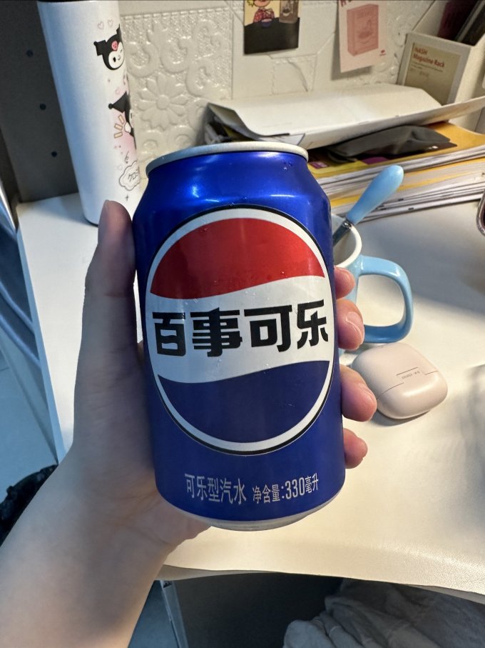 50:15 一,外观与包装 百事可乐罐装,以其独特的蓝色包装和醒目的白色