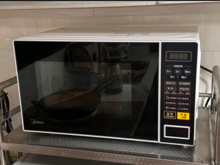 美的（Midea）微波炉  家用小型20升  转盘加热 智能菜单 一键解冻 杀菌电子除味 薄膜按键（M1-L213C）