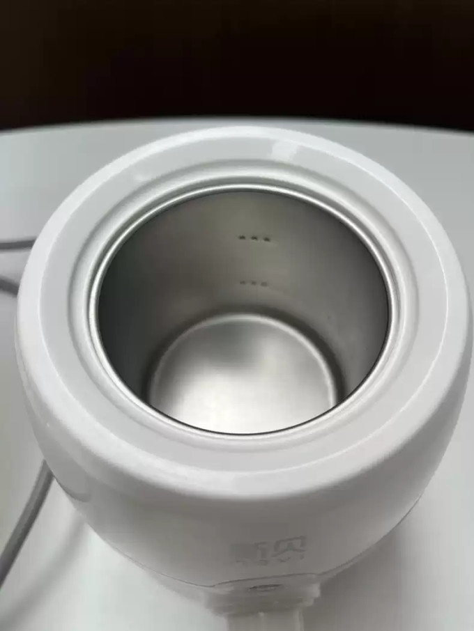 新贝暖奶器