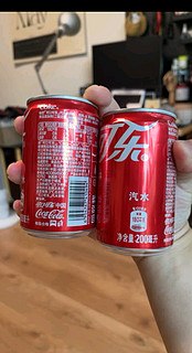 可口可乐（Coca-Cola）汽水 碳酸饮料 200ml*12罐  迷你摩登罐 新老包装随机发货