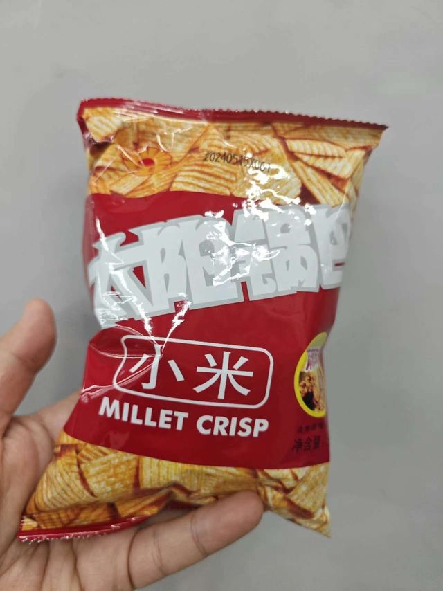 阳光下的酥脆诱惑 —— 太阳牌小米锅巴！