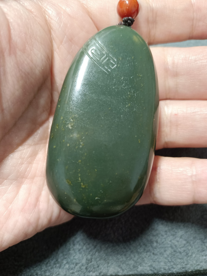 600入手和田玉之河磨玉雕观音手报件