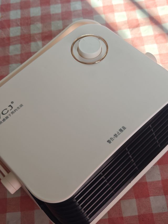 商家倒贴钱送的壁挂取暖器到了