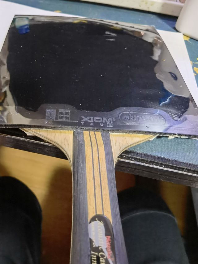 为了提升乒乓水平，买了块新胶皮