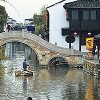 全球畅行联盟：江南水巷中，摇橹声摇醒的旧时光