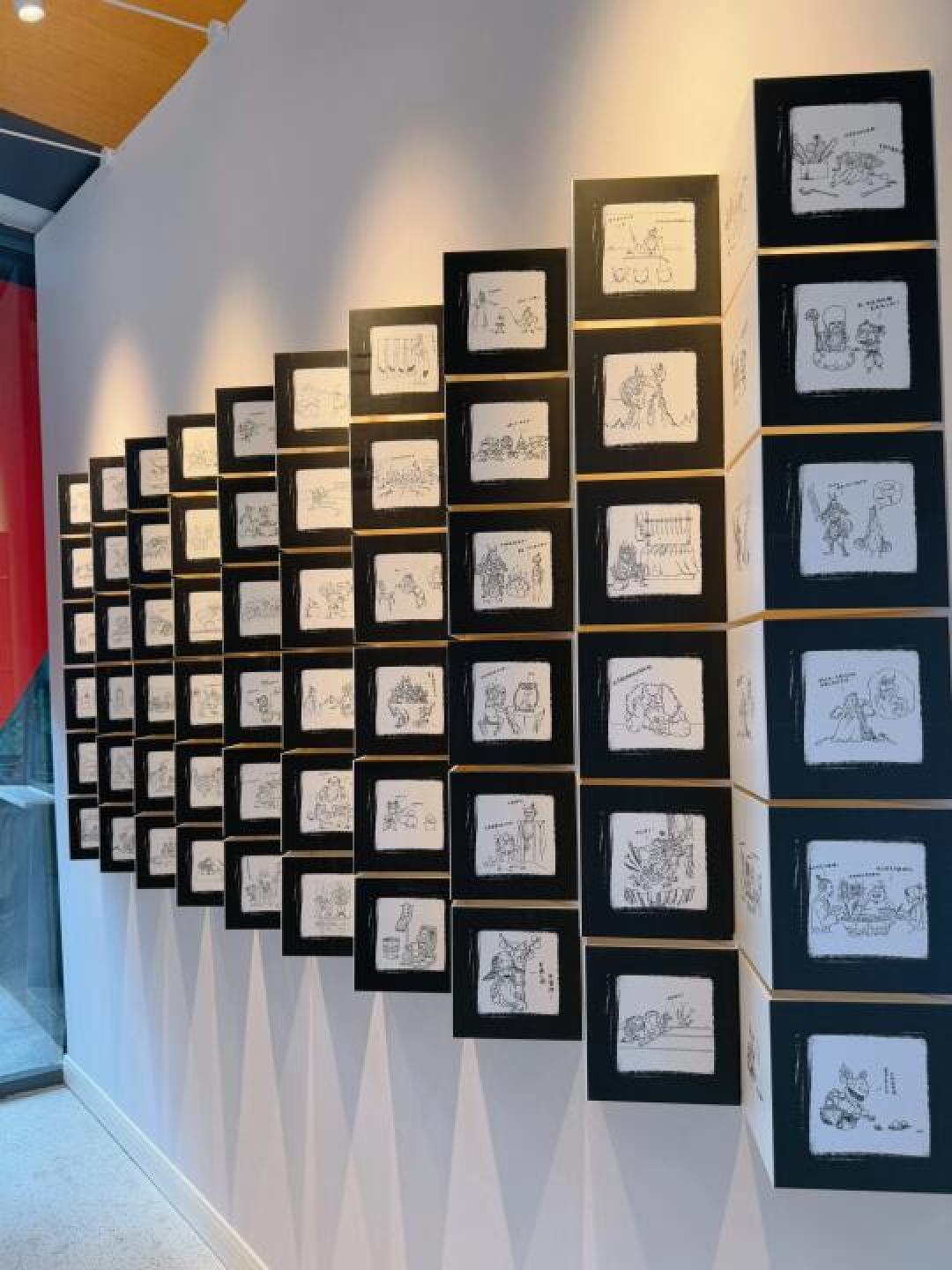 《哪吒2》导演手绘143张破亿海报首展!敖丙撸串、太乙真人"带货"引燃成都