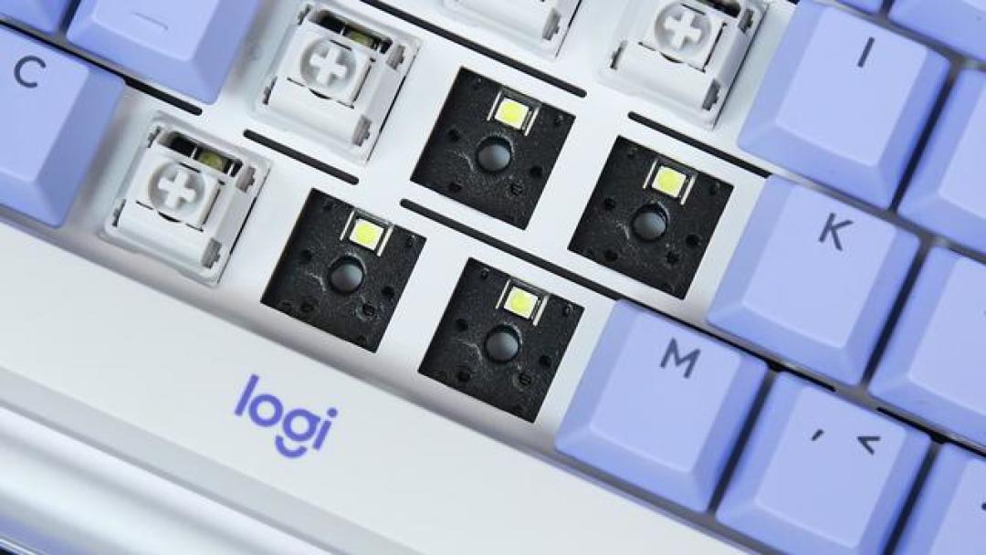 从结构革新到AI赋能:罗技K98M如何重塑机械键盘打字体验