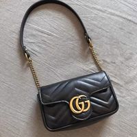 GUCCI Marmont Mini单肩包：经典与时尚的完美结合 