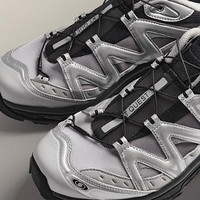 Salomon XT-QUEST黑银渐变：液态金属美学重塑都市户外新风潮