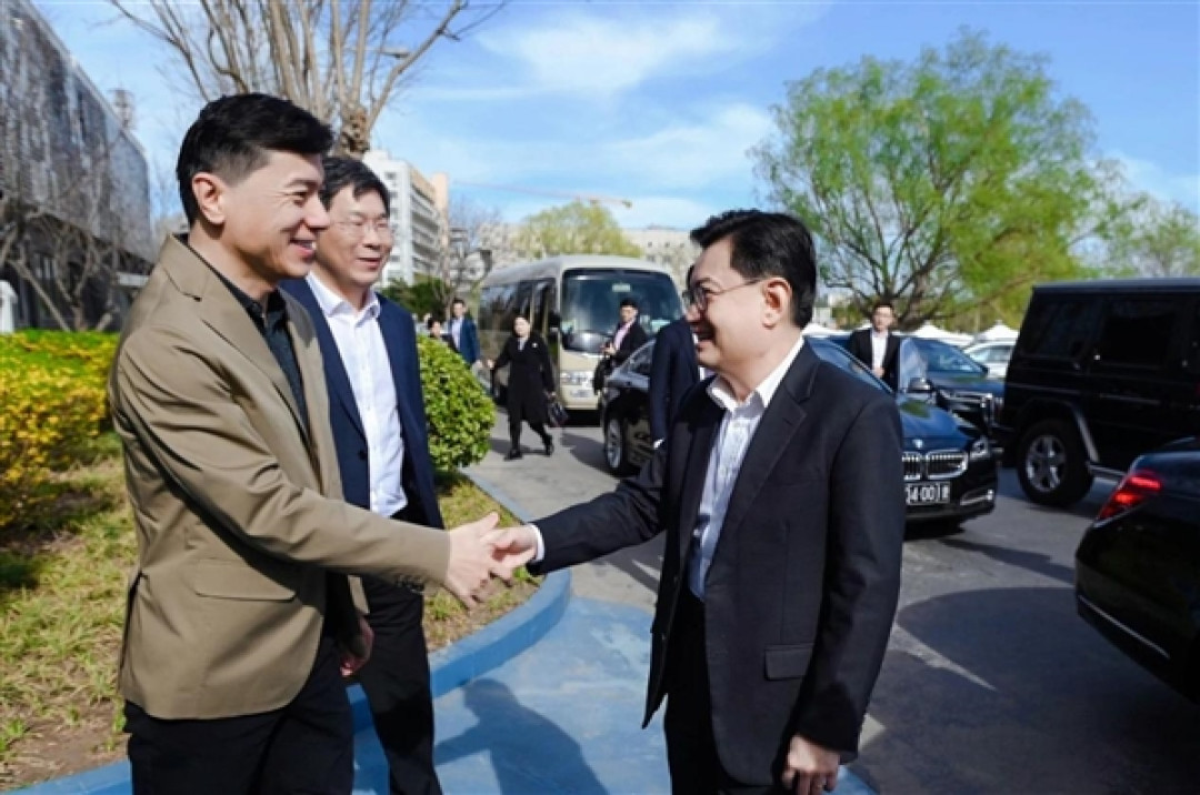 新加坡副总理到访百度!试乘萝卜快跑直竖大拇指点赞
