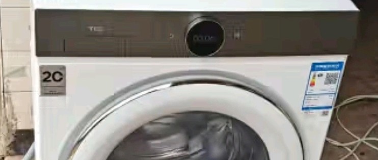 TCL小黄人10公斤大眼萌AI超级筒洗衣机，家居新宠来袭！🛁 _