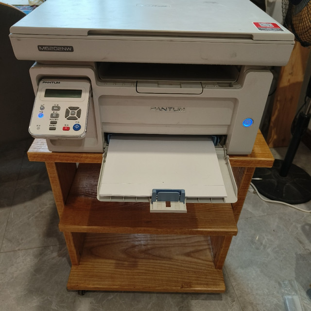 搓个原木桌子放，花300淘来的激光一体机