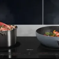 告别传统灶！美的双灶电磁炉如何重塑厨房新体验？