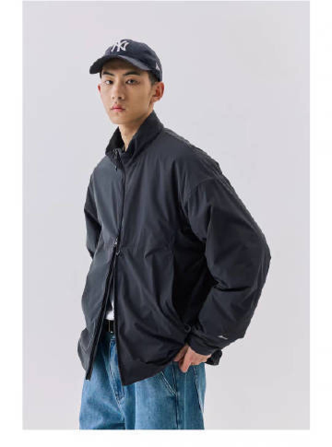 春季型男穿搭攻略:这件轻薄机能夹克如何用黑科技征服全天候场景