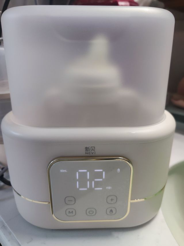新贝温奶器：育儿神器，轻松搞定喂奶那些事儿