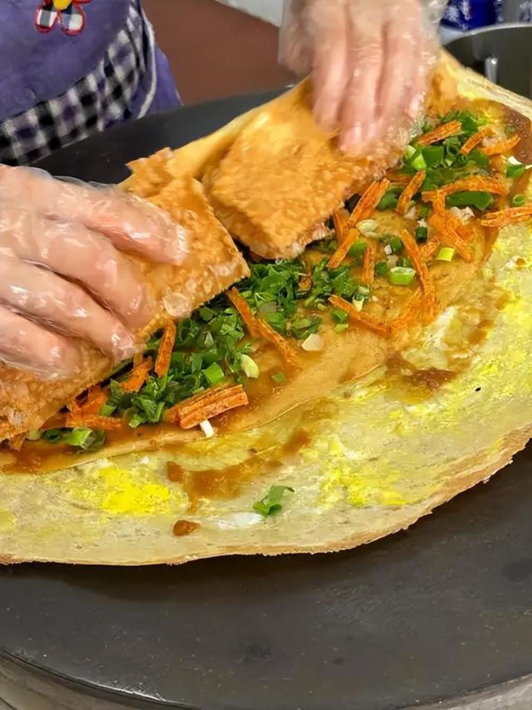 馄饨皮逆袭煎饼果子江湖:3毫米薄脆掀动五百年早餐革命
