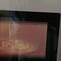 美的机械旋钮微波炉：高效加热三餐