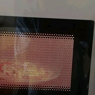 美的机械旋钮微波炉：高效加热三餐