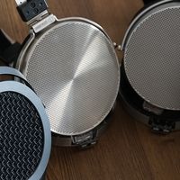 压倒性的平板耳机技术：直径0.1米，薄至0.0012mm，失真0.03%