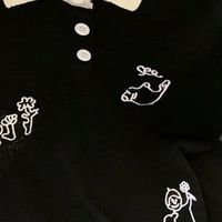 双十一时尚质感：黑色刺绣Polo衫