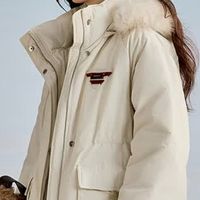 暖杏色茵曼三防羽绒服，通勤路上邂逅时尚与温暖