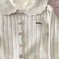 秋日亲子穿搭：环保与温暖同行