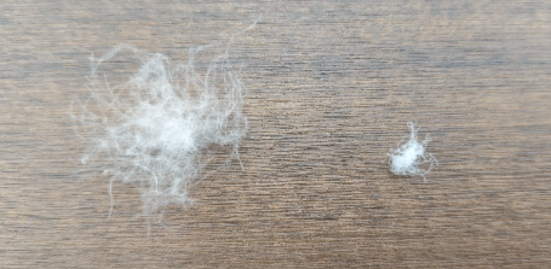 羽绒服的水太深了!我们扒开7万件假货的底裤,终于做出了这件…